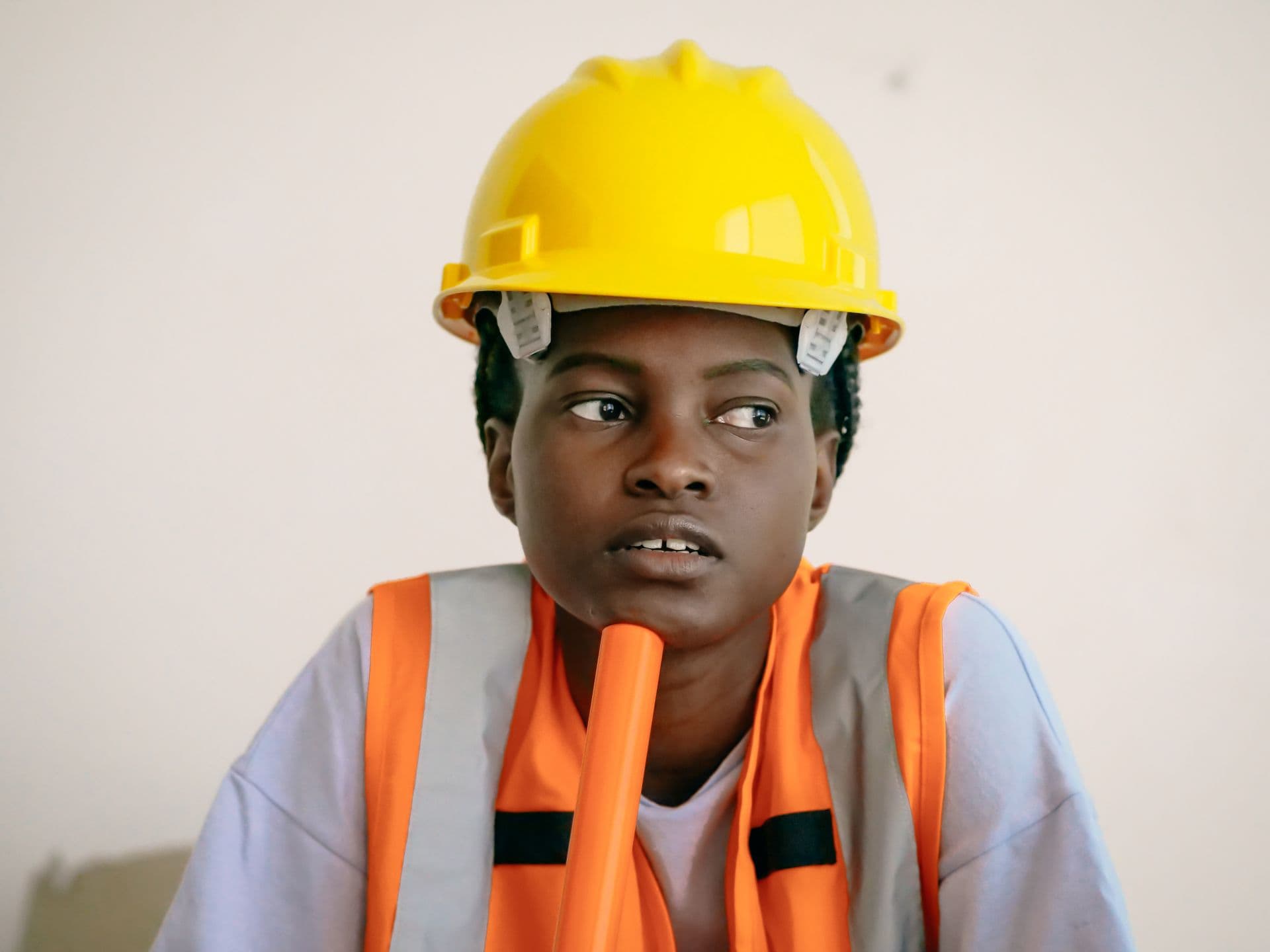 A construction worker assessing a changed condition on site